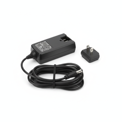 Adapter neatly coiled demonstrating portability