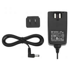 Adapter with prongs detached showing modular design