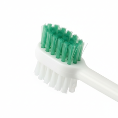 Close-up of bristles and suction tip