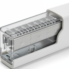 Close-up of clear marked cartridge with staples