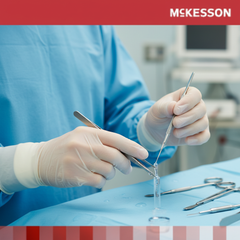 Close-up of gloved hands performing delicate tasks