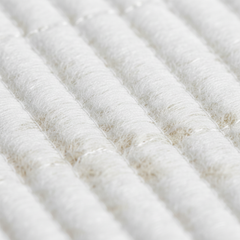 Close-up of quilting pattern and fiber structure