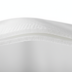 Close-up showing tissue/poly/tissue layers