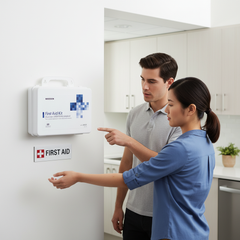 First aid kit mounted in workplace