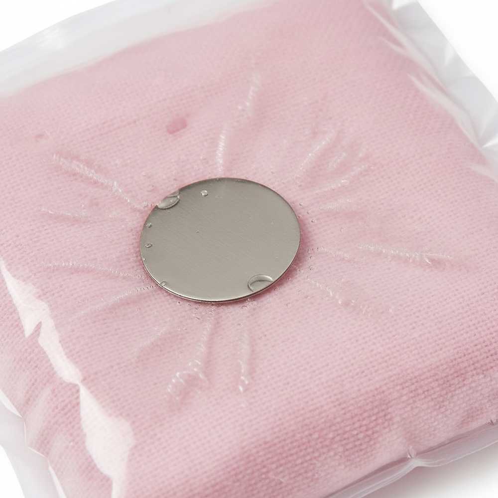 Metal disc activation mechanism close-up