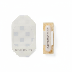 Close-up of ChloraPrep applicator and transparent dressing