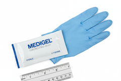 Lubricating jelly packet with size reference