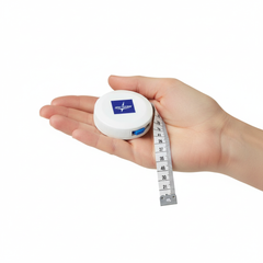 Hand holding measuring tape