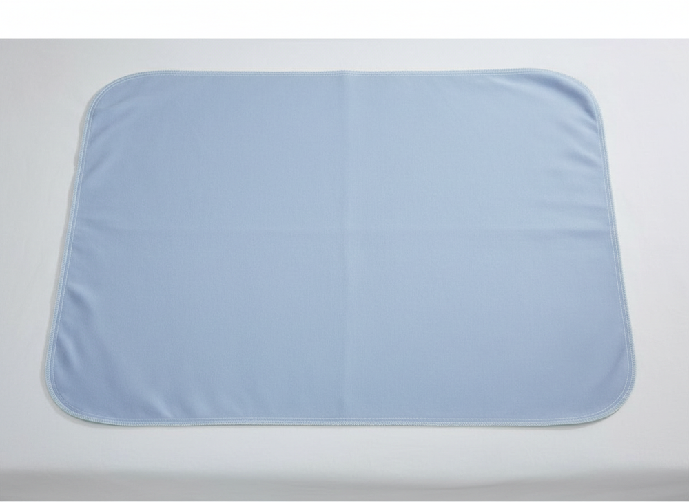 Underpad on hospital bed - flat lay view