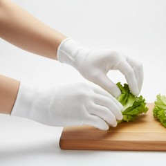 Glove liner demonstrated on hands