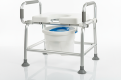 Close-up of commode pail and accessories