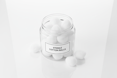 Cotton balls in glass jar - top view