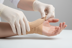 Wrap being applied to wrist for support