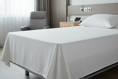 Sheet fitted on hospital mattress - side view
