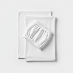 Top-down view of knitted crib sheets