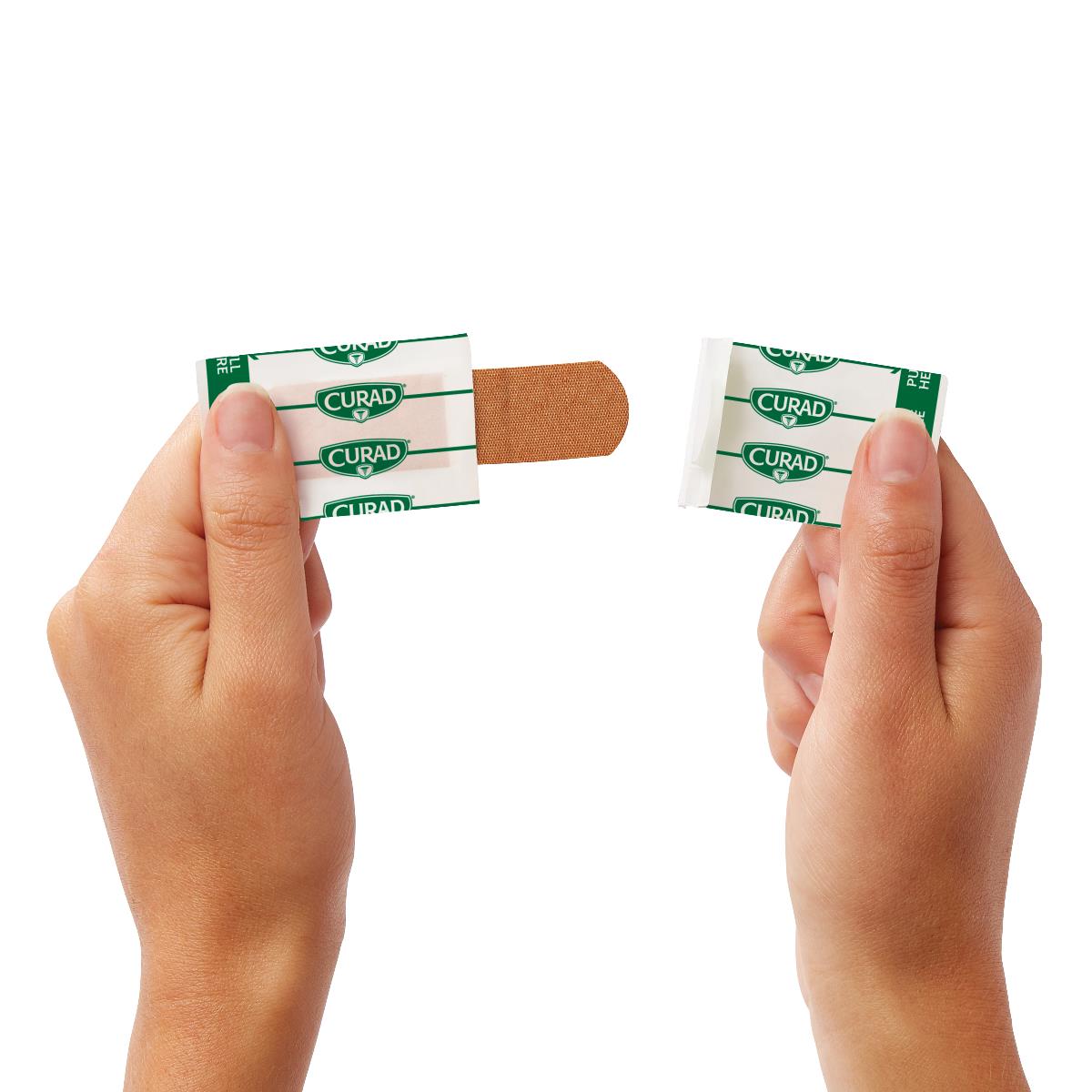 Curad Quick Strip Fabric Adhesive Bandages - Sterile Wound Care Strips for Cuts, Scrapes & Abrasions