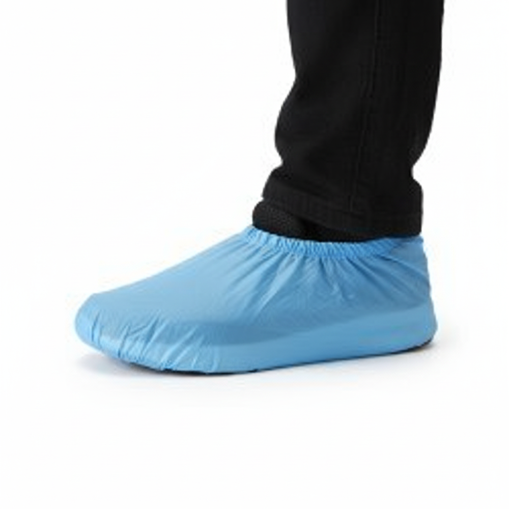 Blue shoe cover worn on shoe
