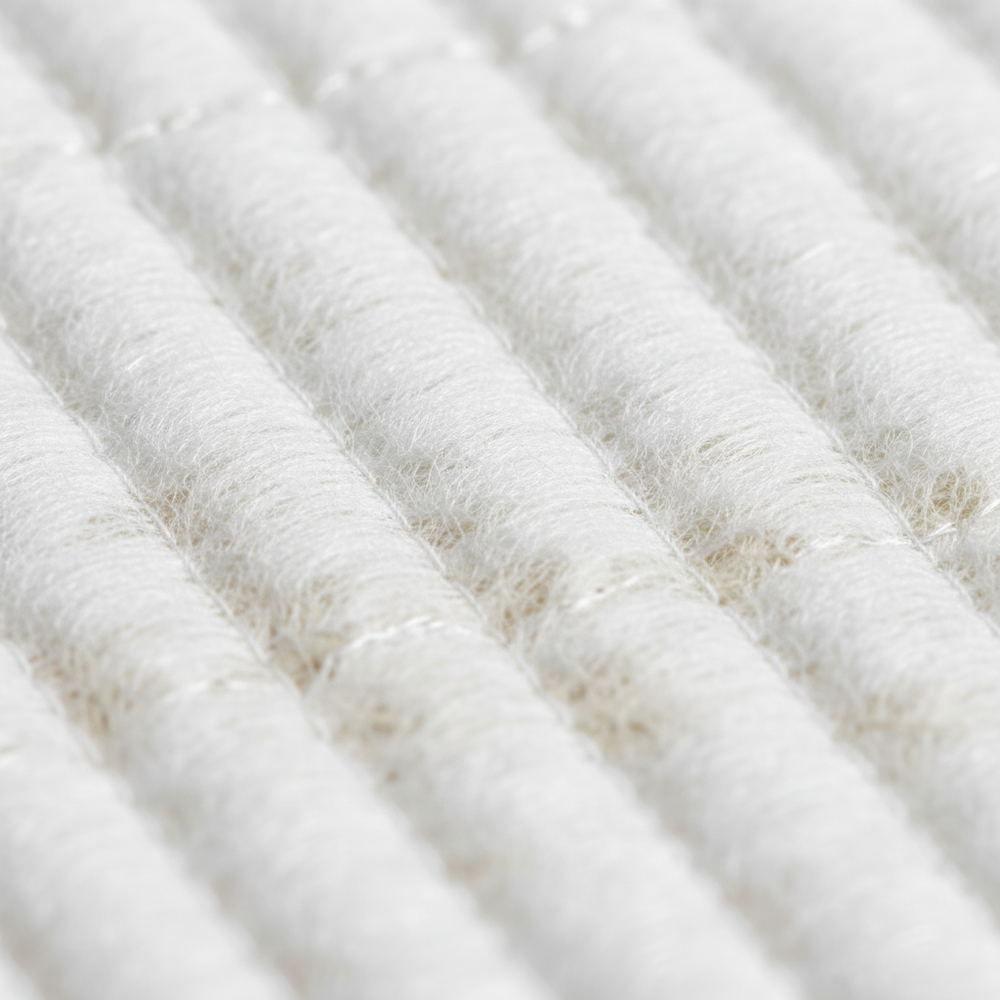 Close-up of quilting pattern and fiber structure