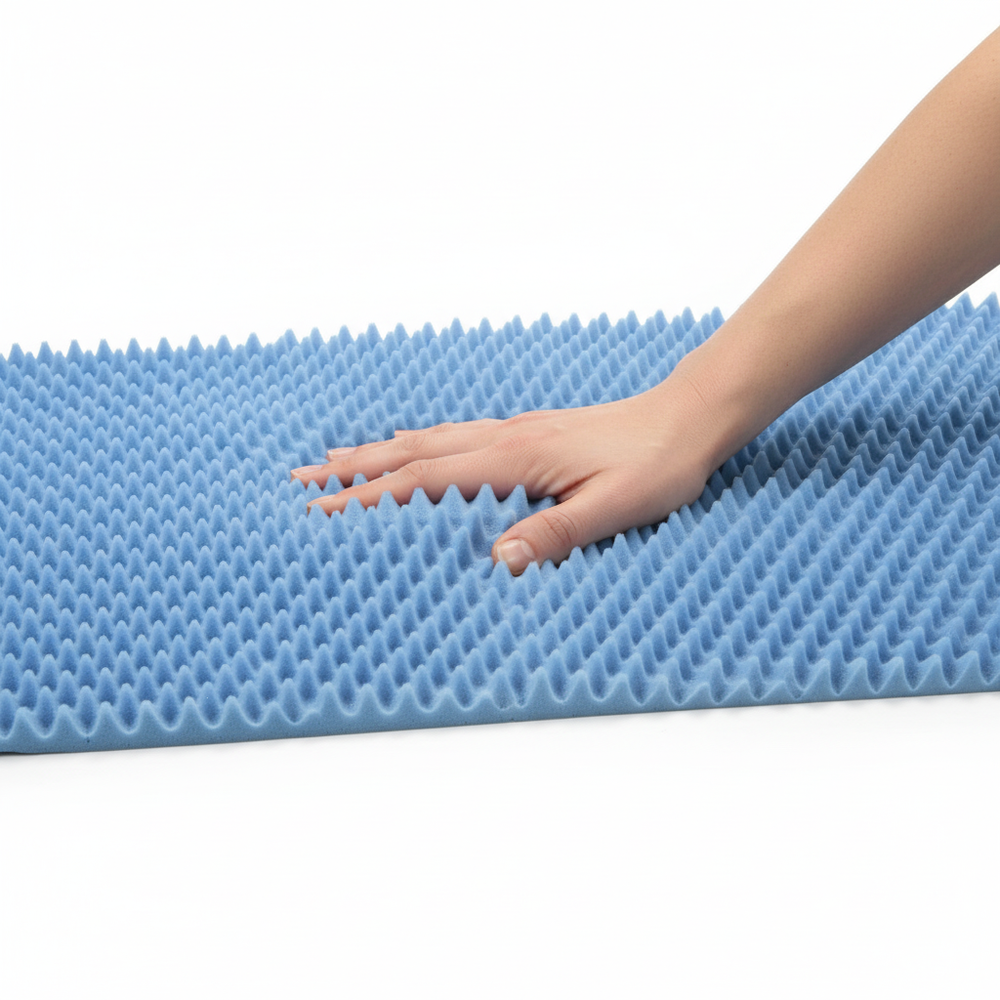 Hand pressing foam showing compression