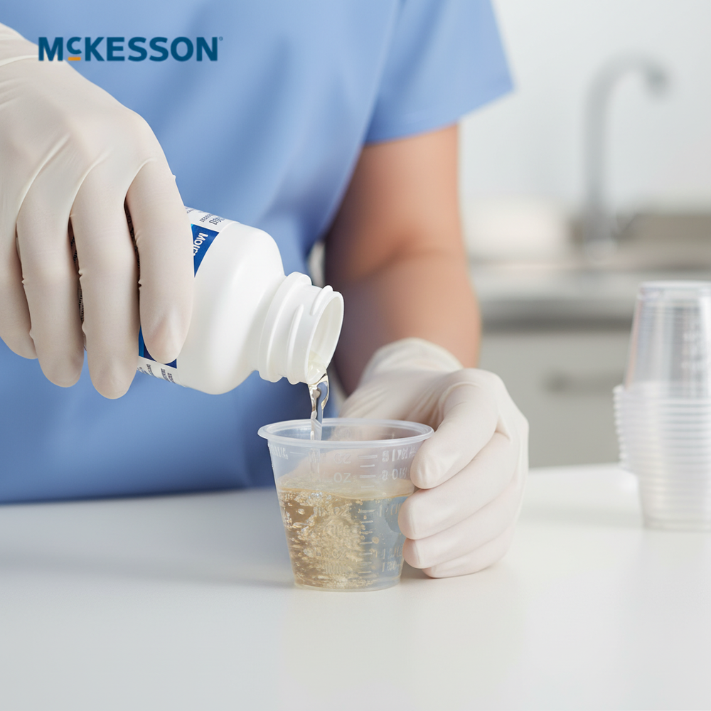 Healthcare worker measuring medication