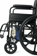 Holder attached to wheelchair frame