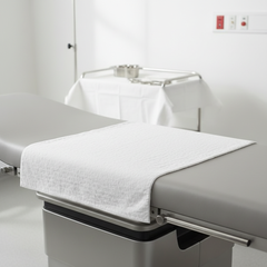 Towel on examination table