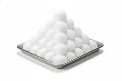 Cotton balls stacked on medical tray