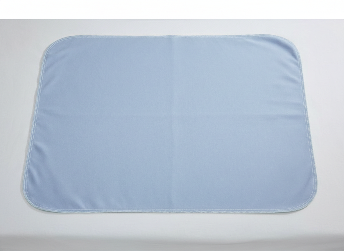 Underpad on hospital bed - flat lay view