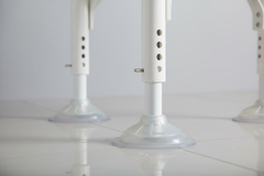 Close-up of suction cup feet and adjustable legs