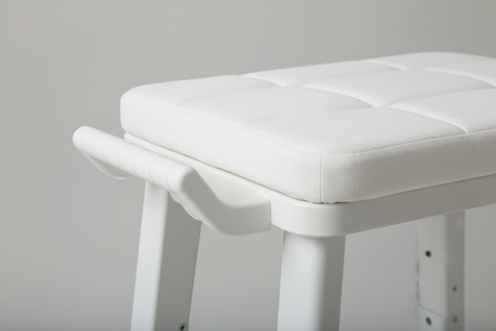 Close-up of padded seat and side arm