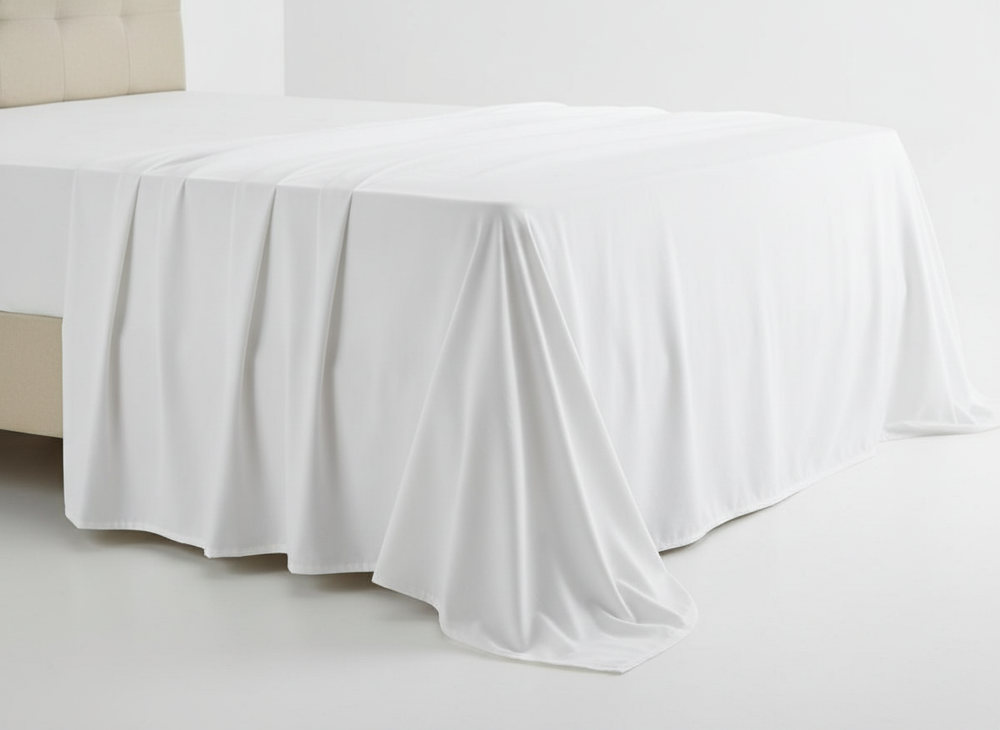 Sheet draped over bed corner