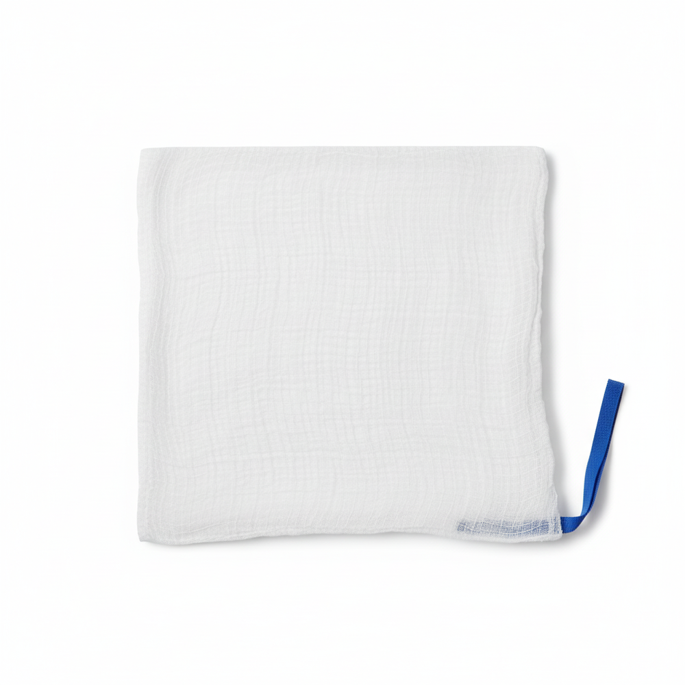 Laparotomy sponge unfolded showing full 18x18 inch dimensions